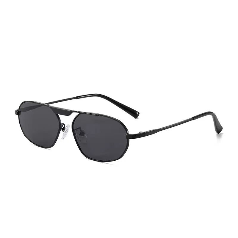 Dame moteriktig solbrille i elegant polygon-design Skanto