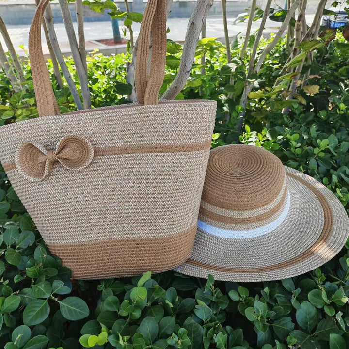 Elegante solhatt med bred brem og diskret stripemønster Skanto