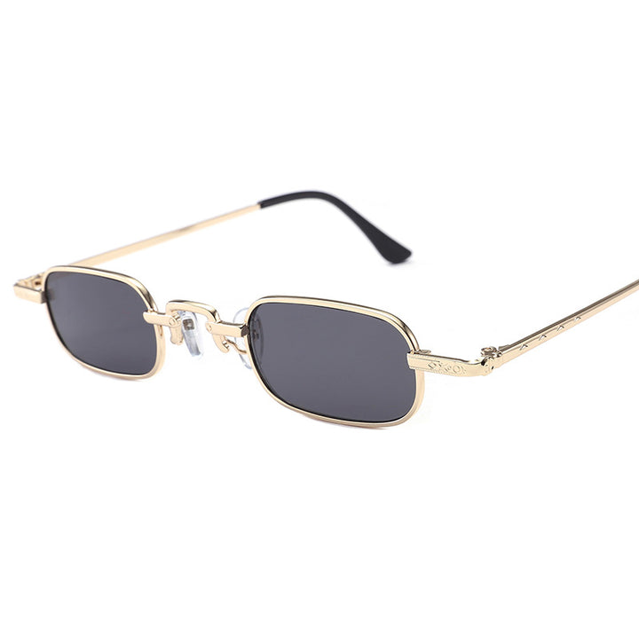 Damer Elegant solbrille med filigranramme og UV-beskyttelse Skanto