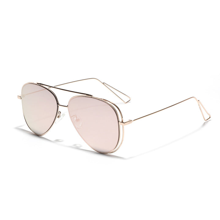 Dame Retro-flyger solbrille med sølvfarget metallramme og speilglass Skanto