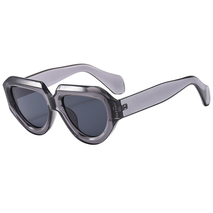 Dame cat-eye solbrille med moderne gjennomsiktig ramme og UV-beskyttelse Skanto