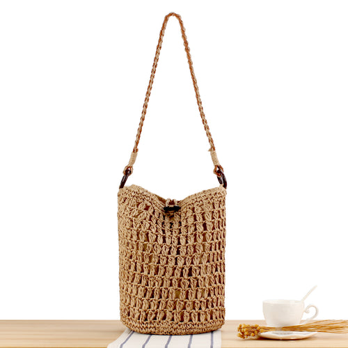 Handbag made of hand-woven natural material with decorative clasp Skanto