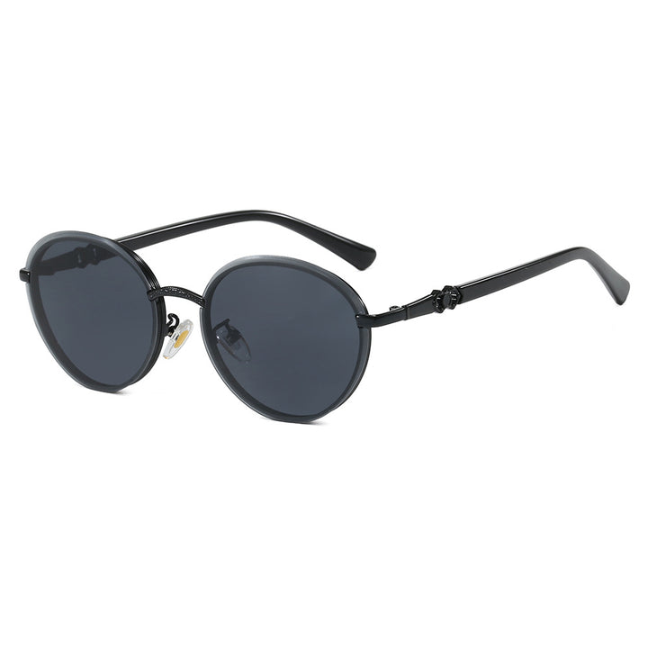 Dame elegant rund solbrille med speilende effekt Skanto