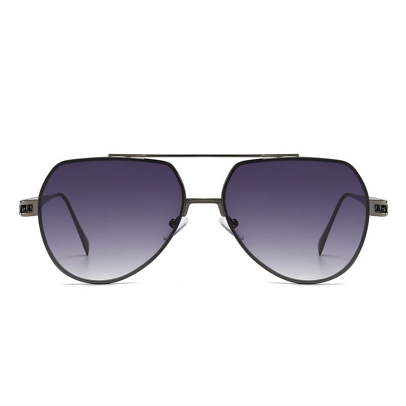 Dame Designer-solbrille i stilfull, bølget metallramme Skanto