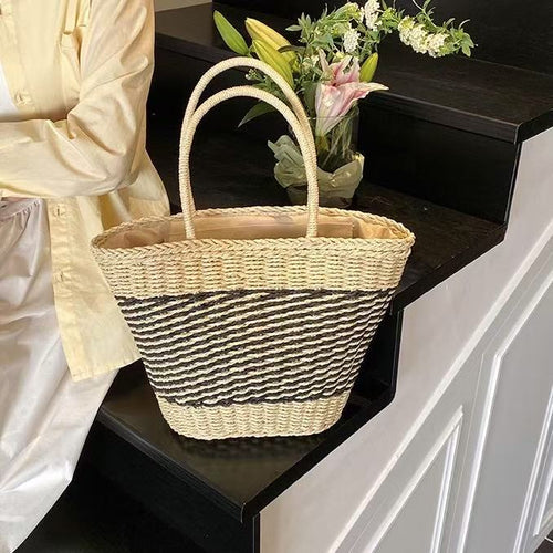 Håndveske i elegant bølgemønster Skanto