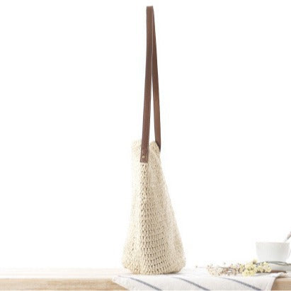 Handbag made of hand-knotted natural material with adjustable shoulder strap Skanto