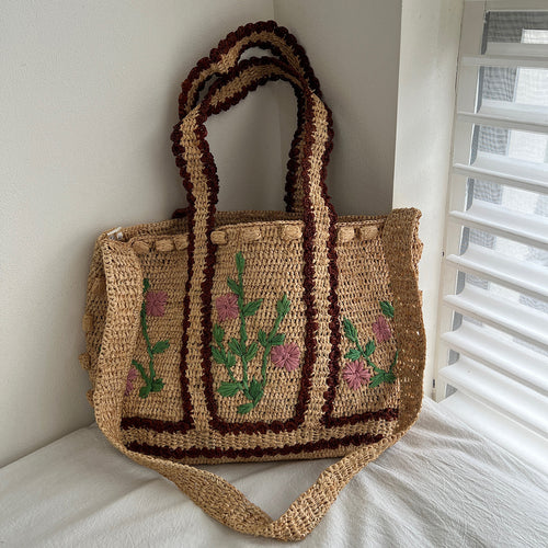 Flettet skulderveske med blomsterdesign Skanto