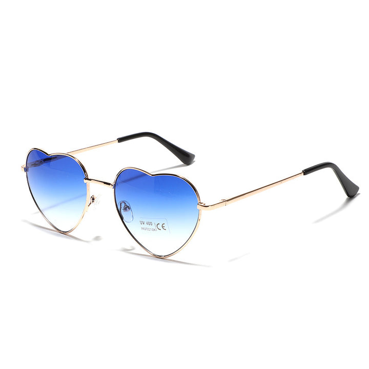Dame hjerteformet solbrille med UV-beskyttelse og delikat ramme Skanto