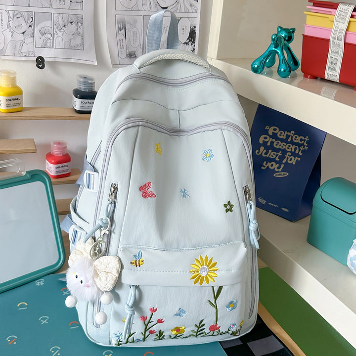 Brodert blomsterdetalj skole ryggsekk