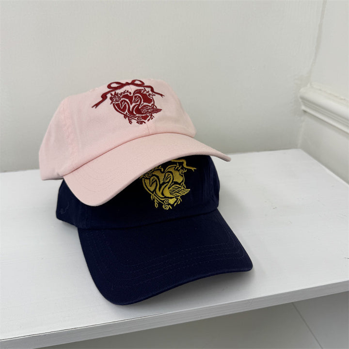 Kvinners broderte svanetema baseball cap Skanto