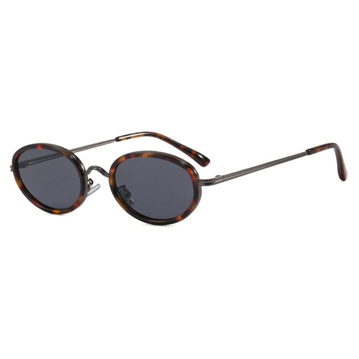 Dame elegant rund solbrille med moderne metallramme Skanto