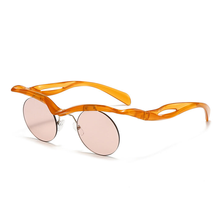 Dame moteriktig solbrille med innovativ ramme Skanto