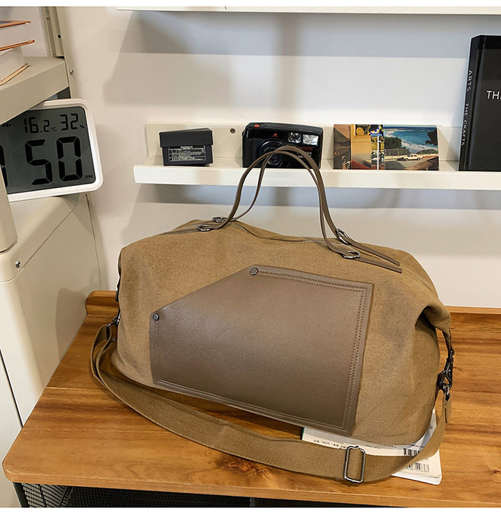 Sporty reiseveske laget av slitesterkt materiale med praktiske rom Skanto