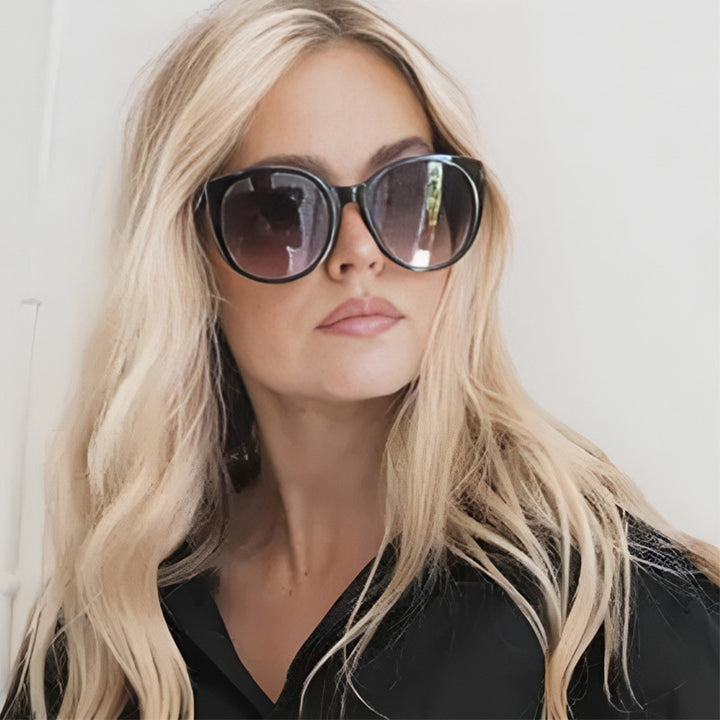 Dame Cat-Eye solbriller med høykvalitets plastramme og beskyttende glass Skanto