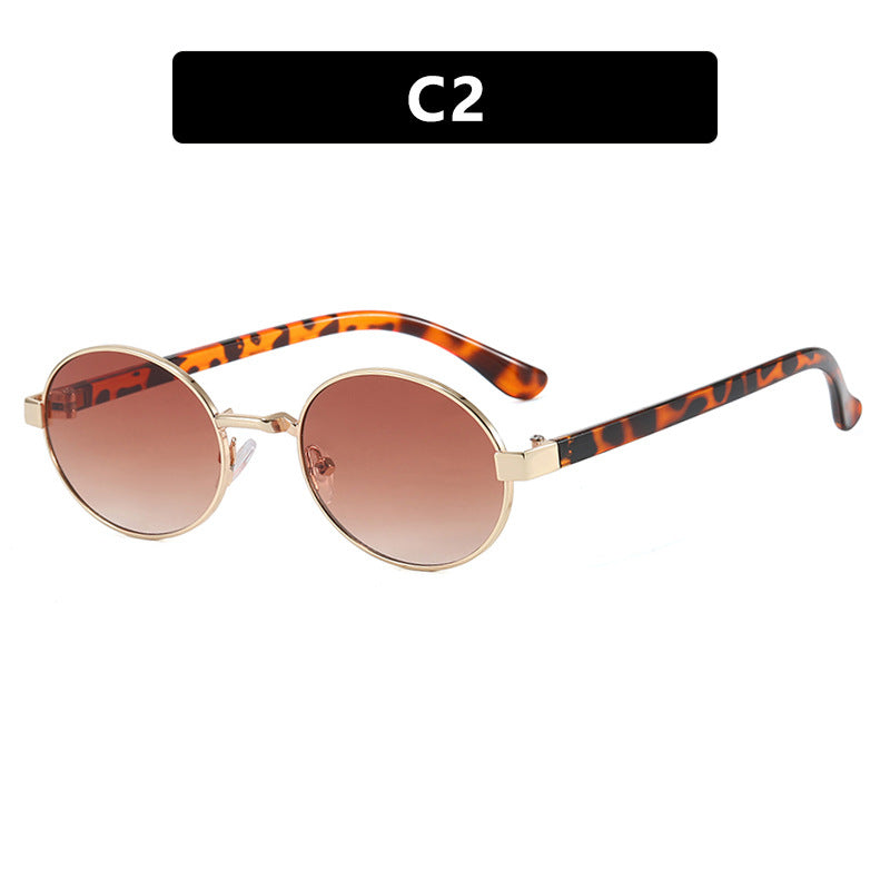 Dame rund brille med elegant metallramme og justerbare nesepads Skanto