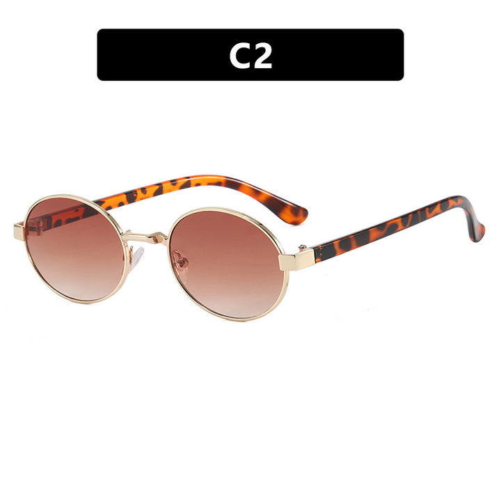 Dame rund brille med elegant metallramme og justerbare nesepads Skanto