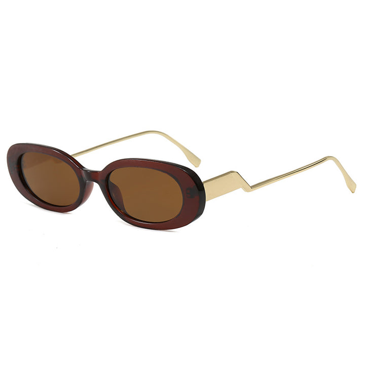 Dame retro-inspirert solbrille med moderne design og markant ramme Skanto