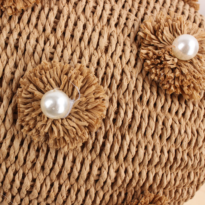 Handbag with unique pearl embellishments Skanto