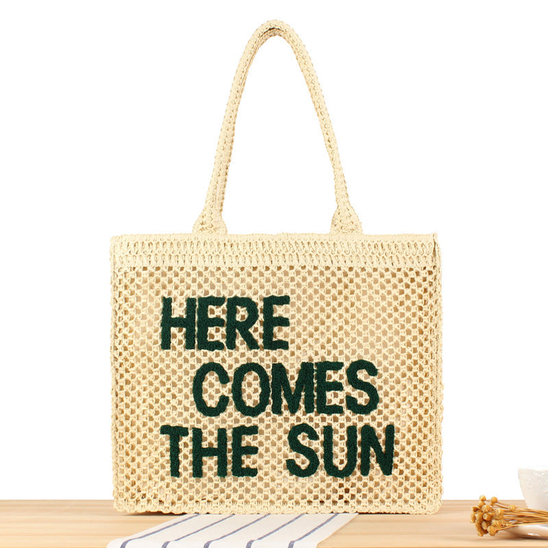 Hand-knotted basket bag with colorful inscription Skanto