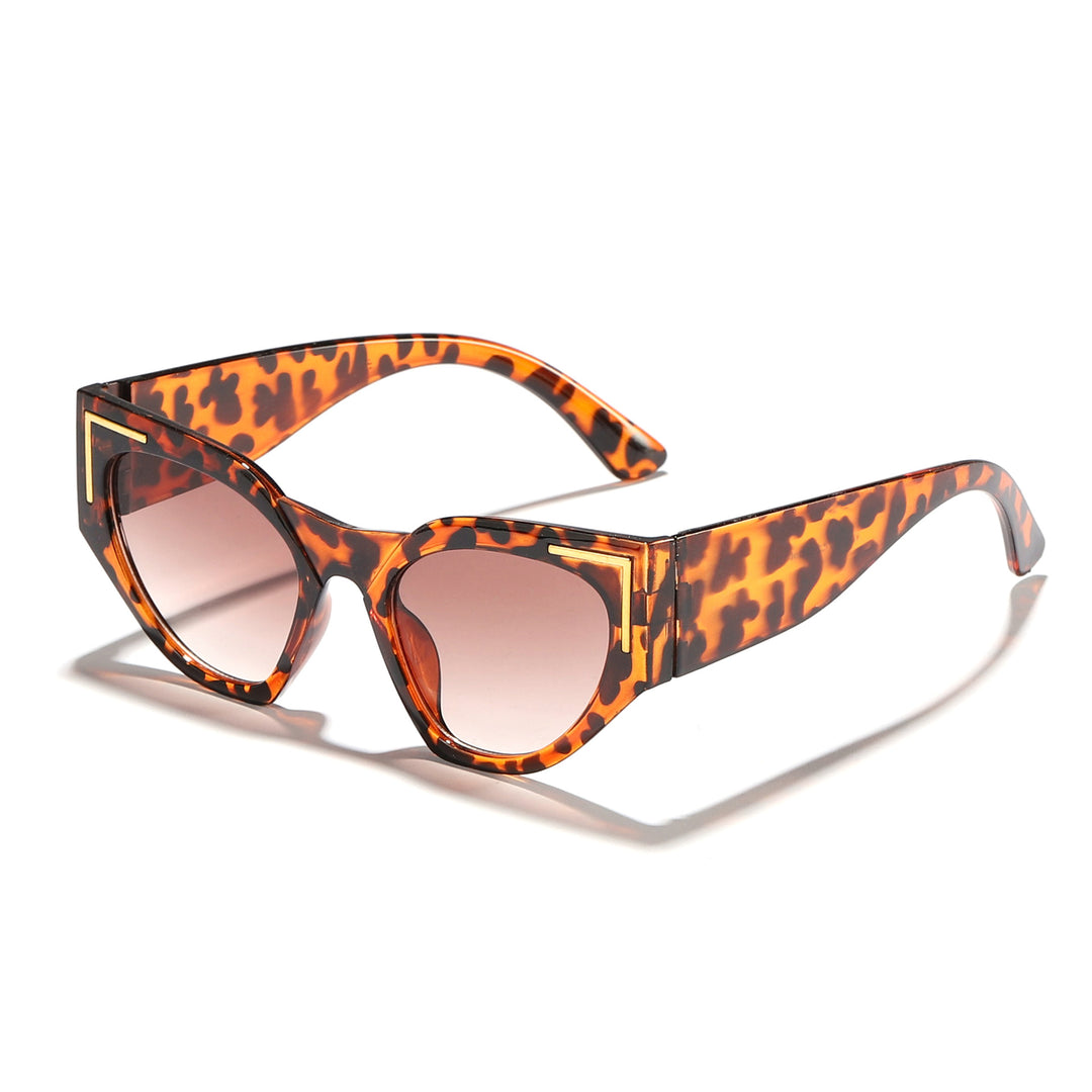 Dame kreativ Cat-Eye solbriller med transparent ramme og brune glass Skanto