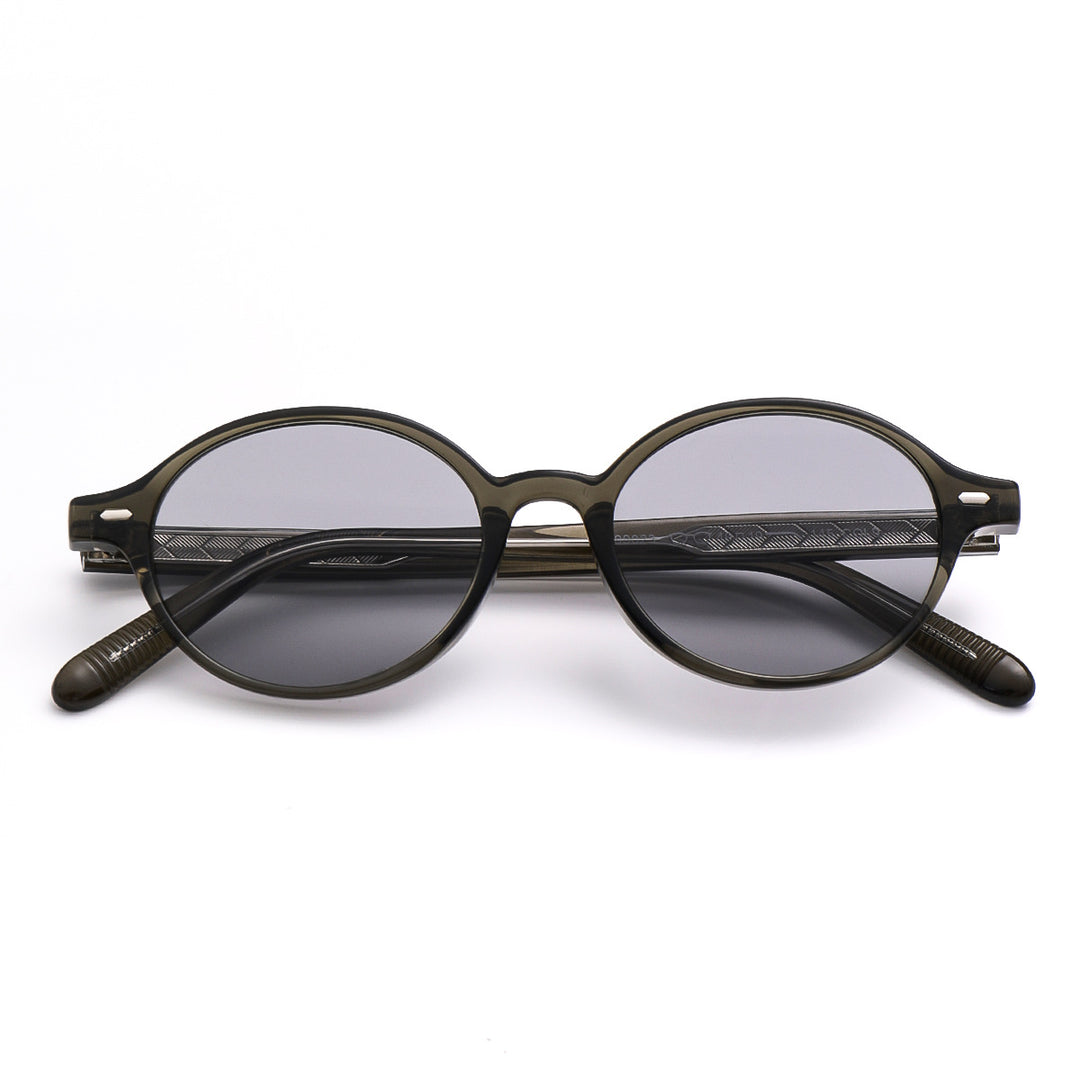 Dame moteriktig solbrille i oval design med stilige detaljer Skanto