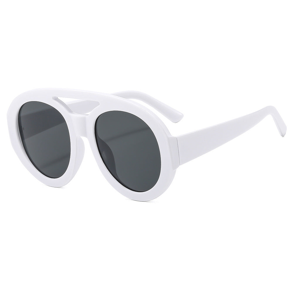 Dame Mote Solbriller i futuristisk oversized-design Skanto
