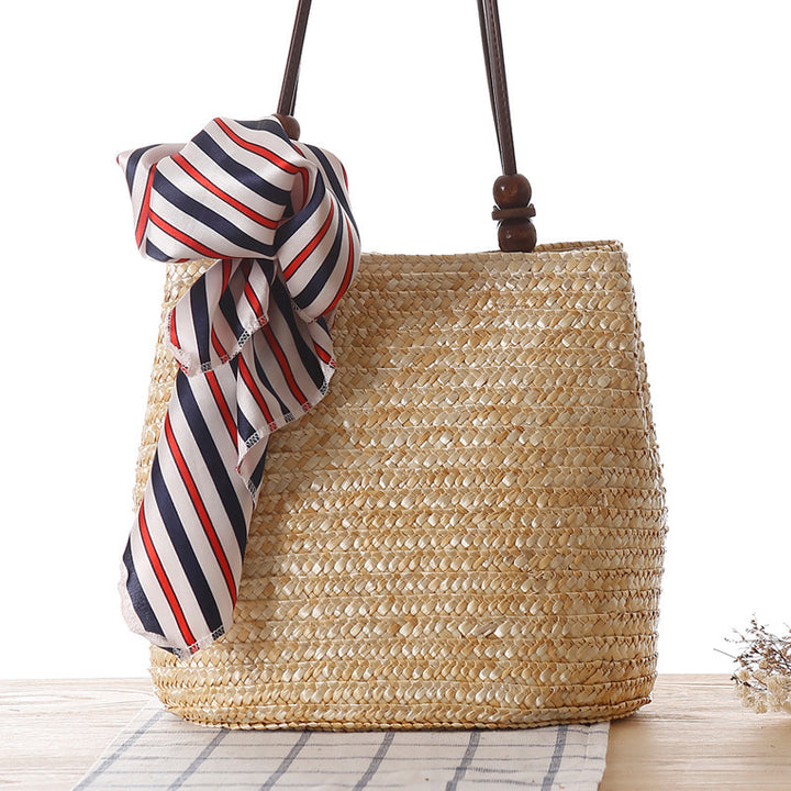 Elegant basket bag with stylish ribbon detail Skanto