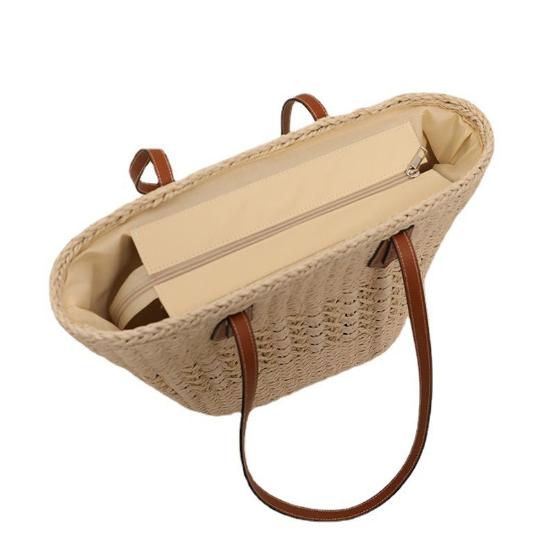 Håndlaget rattan kurvveske med elegante lærdetaljer Skanto