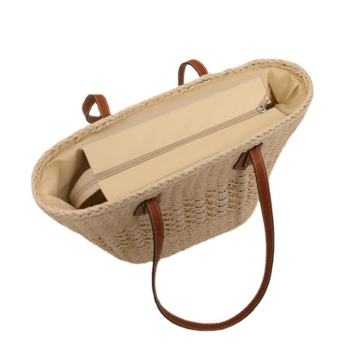 Håndlaget rattan kurvveske med elegante lærdetaljer Skanto