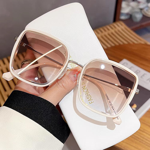 Dame oversized solbriller med elegant metallramme og polariserte linser Skanto