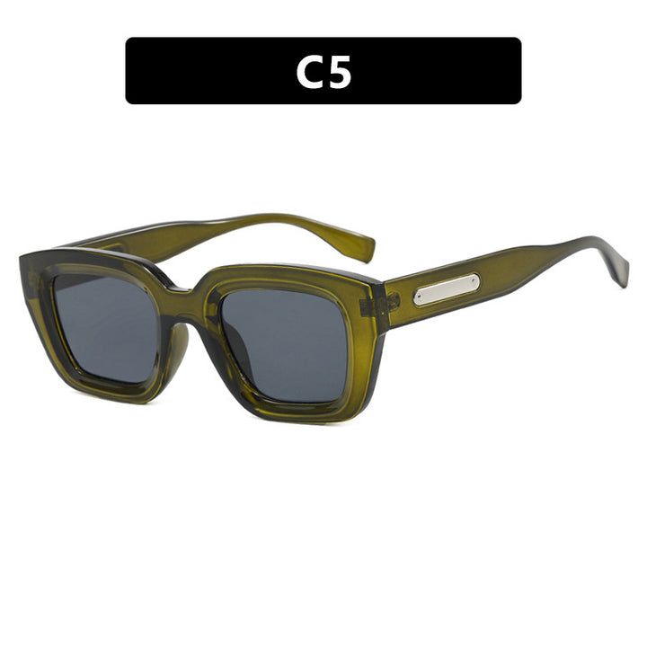 Dame kvadratisk solbrille med gjennomsiktig ramme og brune glass Skanto