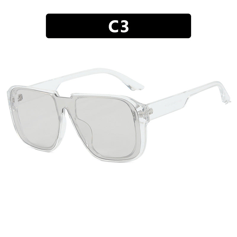 Dame trendy firkantet solbrille med gjennomsiktig, grønn ramme og beskyttende UV-filter Skanto
