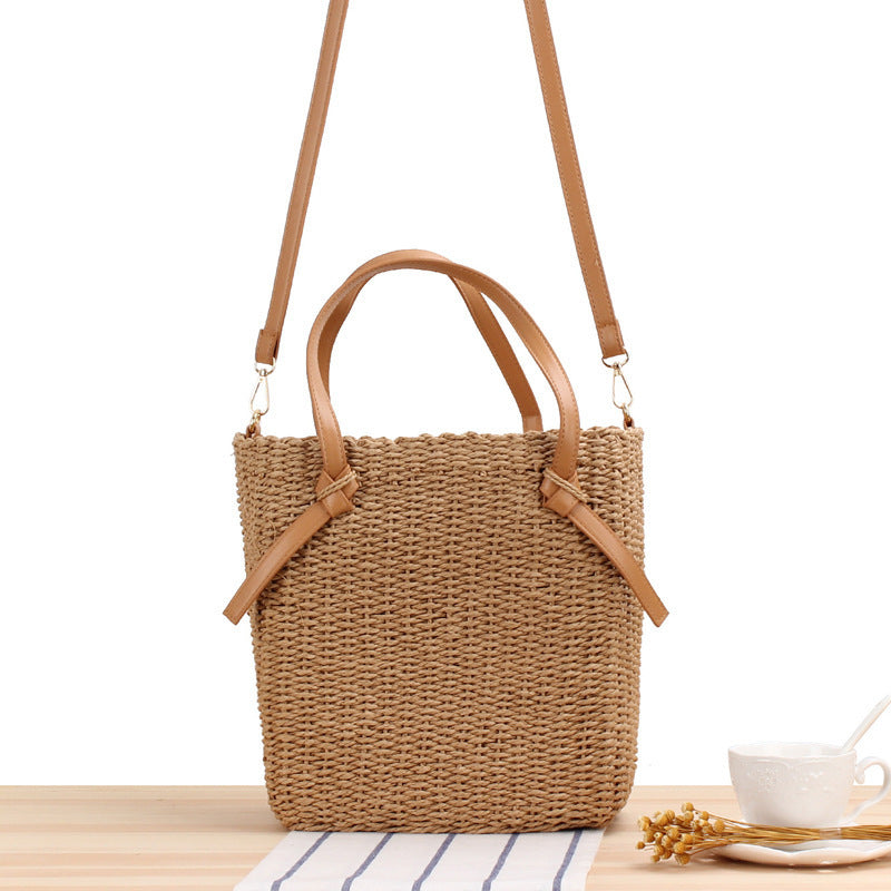 Woven natural material handbag with detachable leather handles Skanto