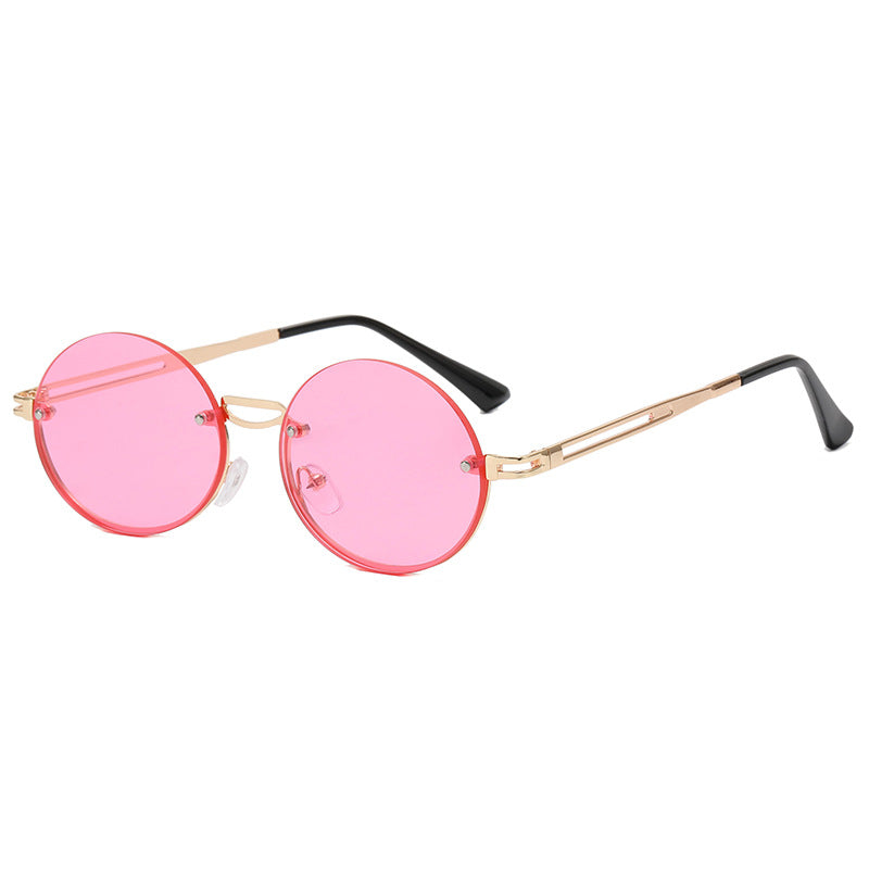 Dame rund solbrille med fin metallramme Skanto