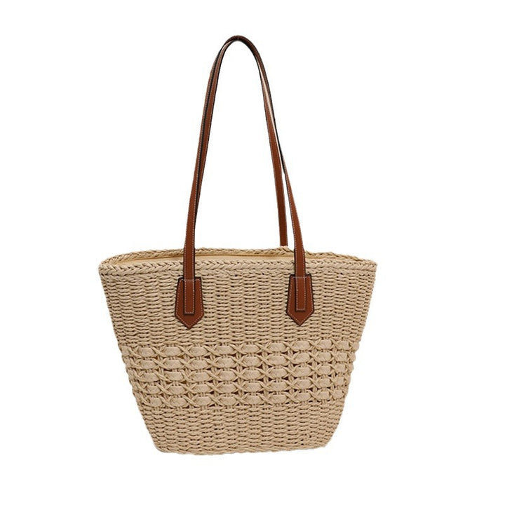 Håndlaget rattan kurvveske med elegante lærdetaljer Skanto