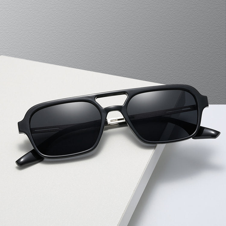 Dame designer solbrille med blå linser Skanto