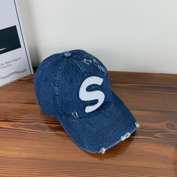 Kvinne's Slitt Grafisk Logo Baseball Cap Skanto
