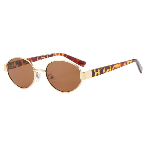 Dame fashionable solbriller med eksklusivt leopardmønster og elegant metallramme Skanto