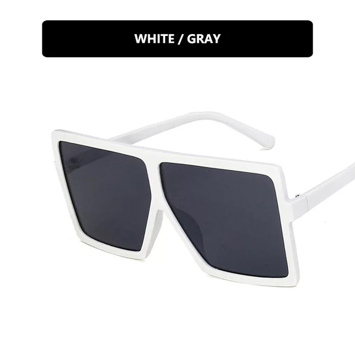 Damer moderne oversized solbrille med transparent ramme og stilige linser Skanto
