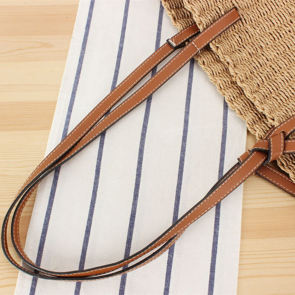 Beach bag made of hand-woven natural material with sturdy leather straps Skanto