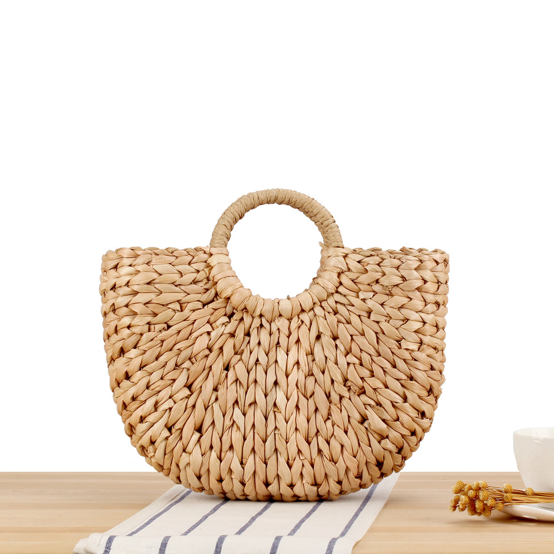 Handbag of handmade natural material with elegant round handle Skanto