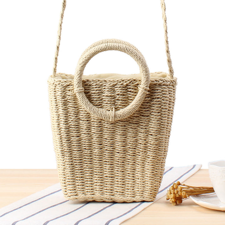 Woven natural material handbag with round handle Skanto