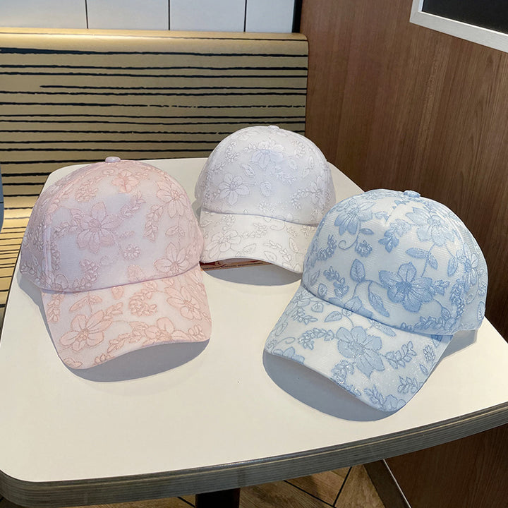 Kvinnens blomsterbroderte baseballcap Skanto