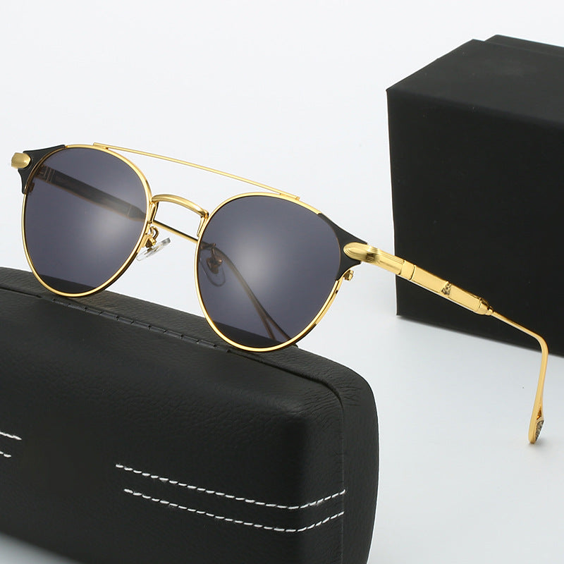 Dame rund Vintage-solbrille med høykvalitets metallramme og robust design Skanto