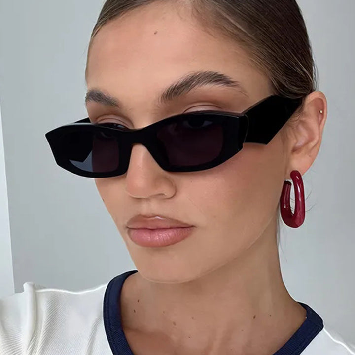 Dame trendy Cat-Eye solbriller med unikt ramme og UV-beskyttelse Skanto