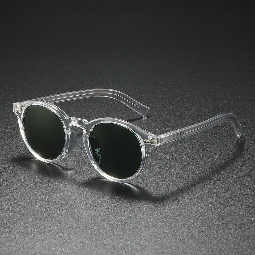 Dame Rund-solbrille med transparent ramme og reflekterende glass Skanto
