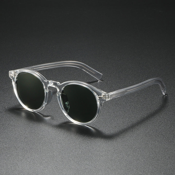 Dame Rund-solbrille med transparent ramme og reflekterende glass Skanto