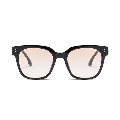 Dame solbrille i innovativ design med bred ramme Skanto