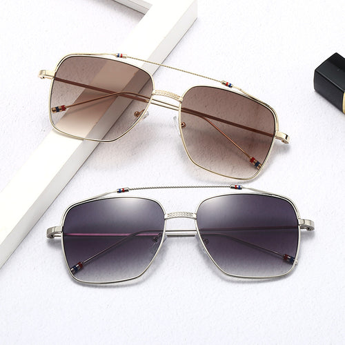 Dame moteriktig buet brille med smal metallramme Skanto