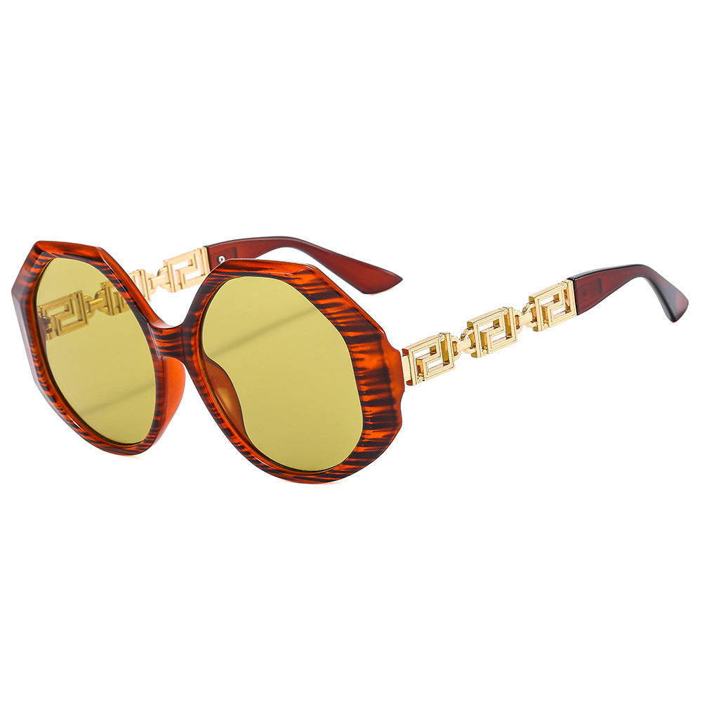 Dame oversized solbrille med iøynefallende oktagonal design Skanto